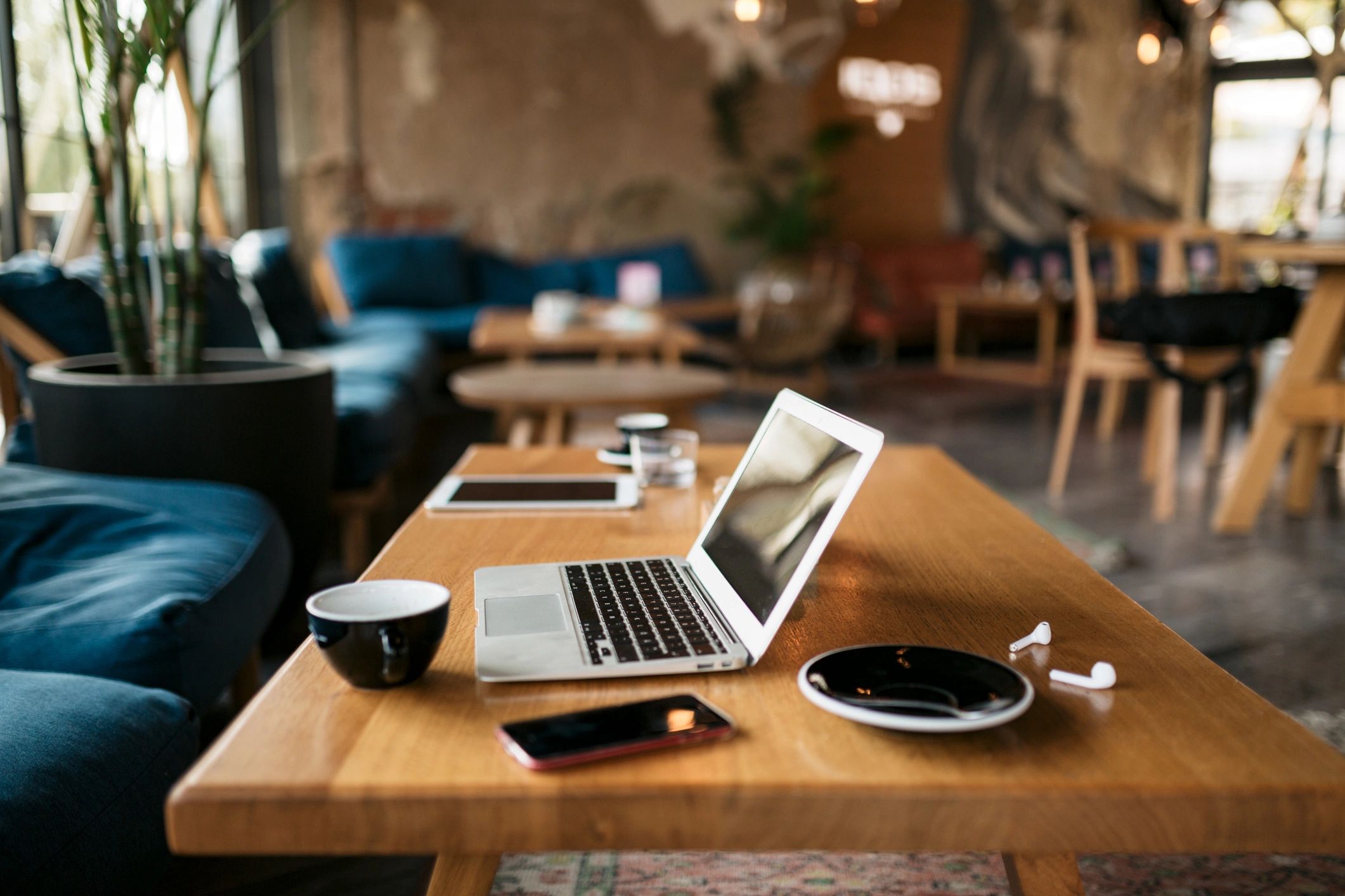 Workspace with laptop representing a member portal and account dashboard